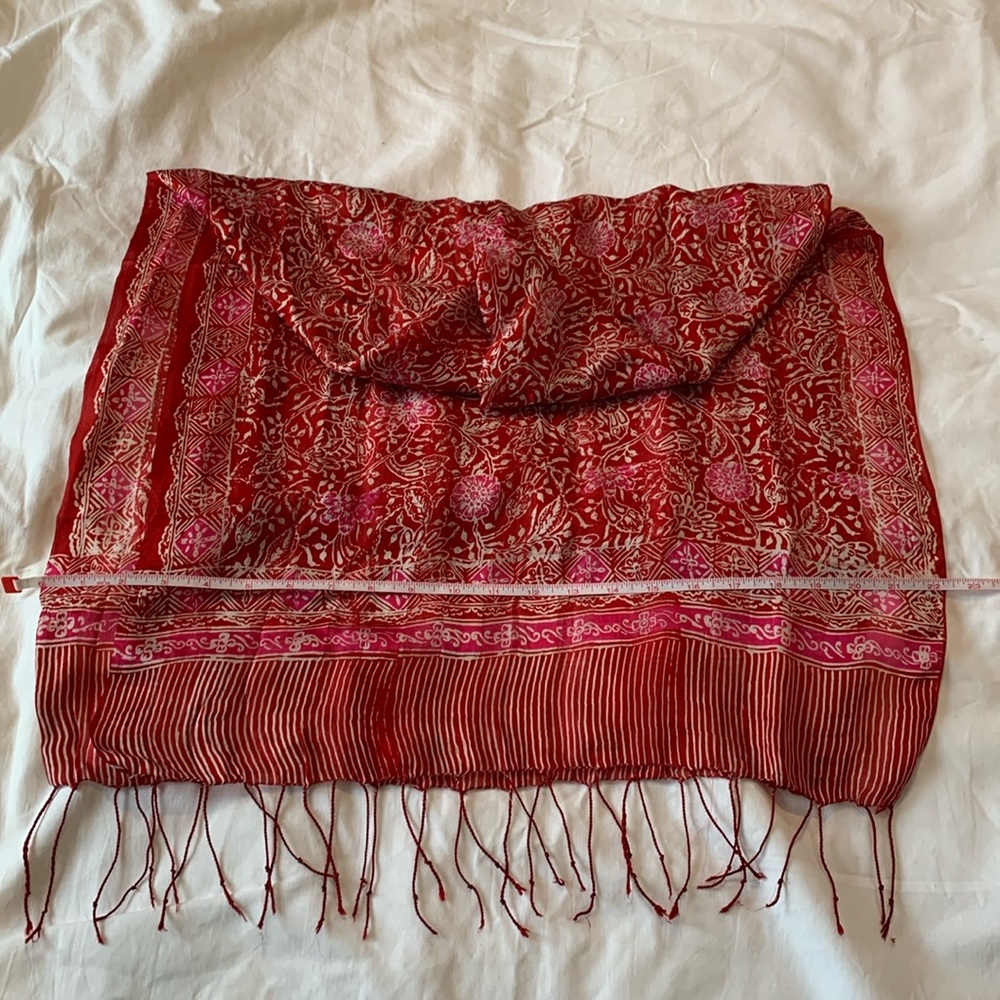Beautiful long red and pink floral silk scarf.